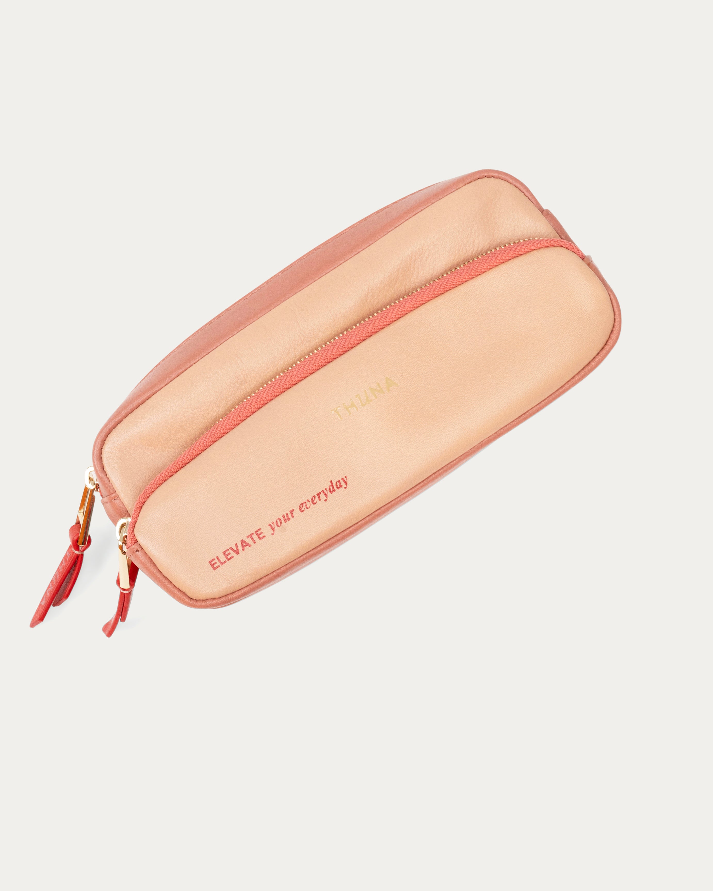 Beige and red rectangular pouch with 'Elevate your everyday' text on a light gray background - Kuwait bags - KSA Bags 