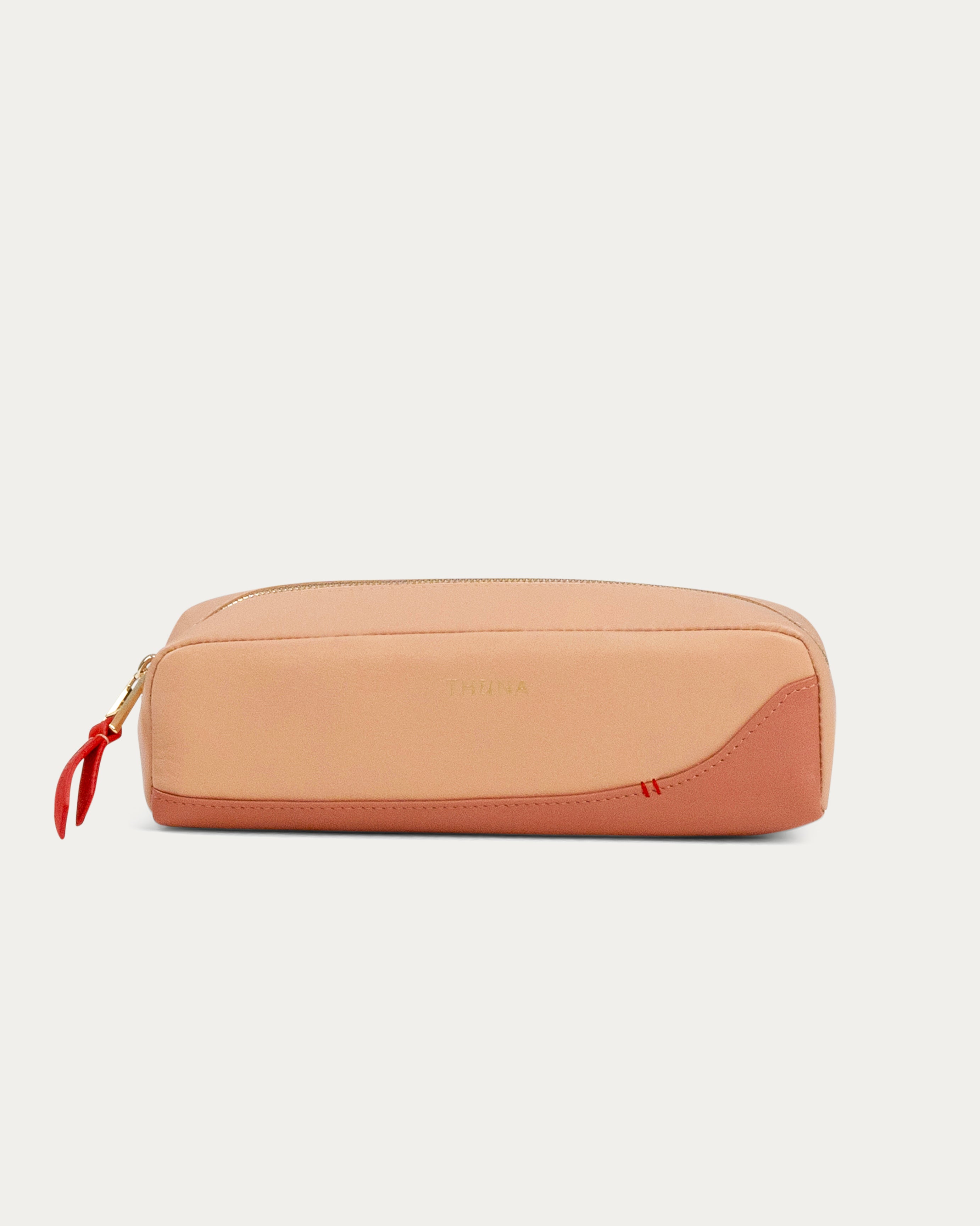Two-tone beige and pink pouch with a red zipper on a white background - Kuwait BAGS - KSA bags 