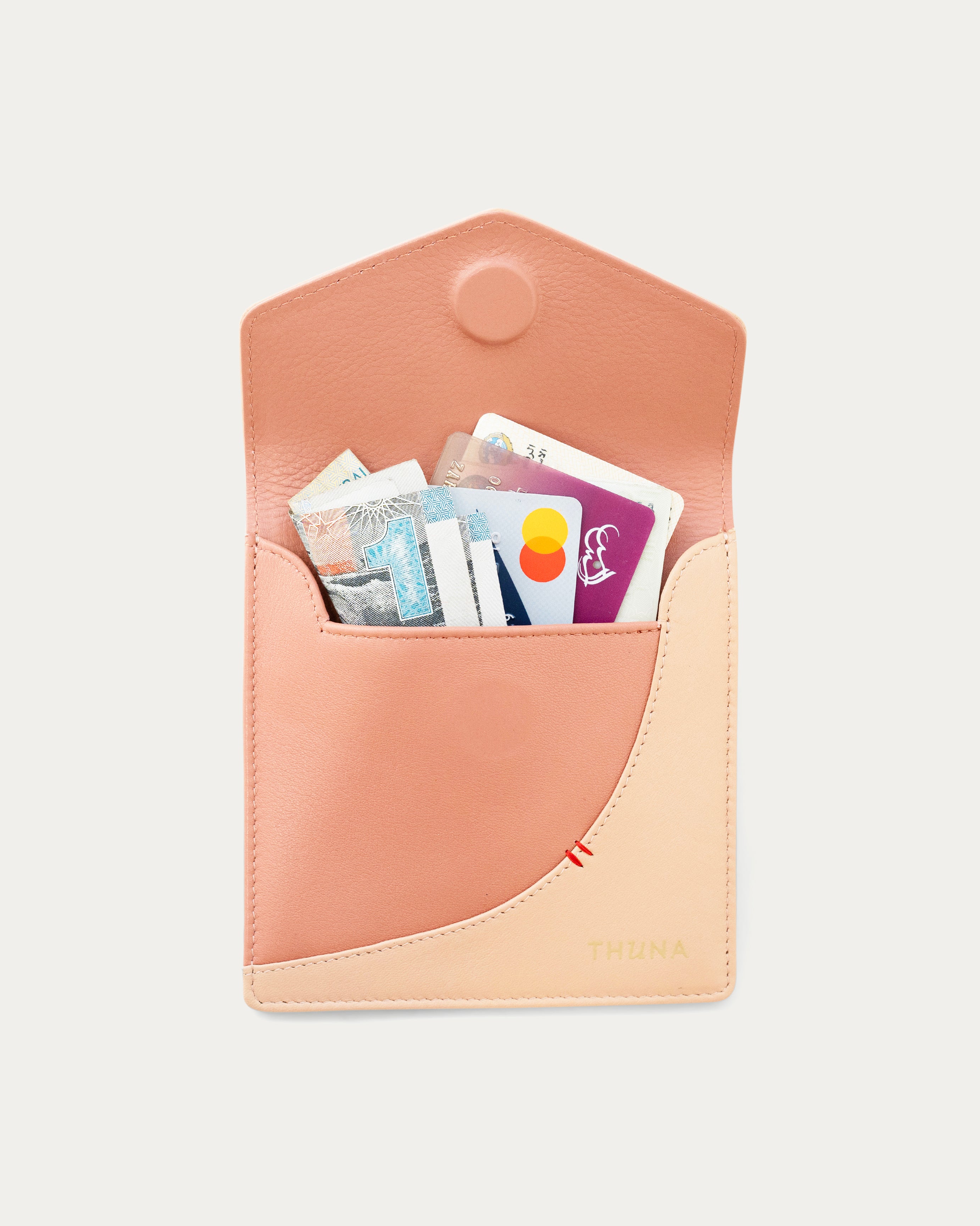 Small peach-colored envelope-style pouch - Kuwait bags - KSA 